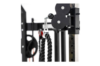 Black cable pulley system with dual rope attachment and metal carabiner on functional trainer frame