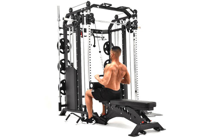 Black and white multi-station functional trainer with cable crossover system, Smith machine, and attached bench, shown with s