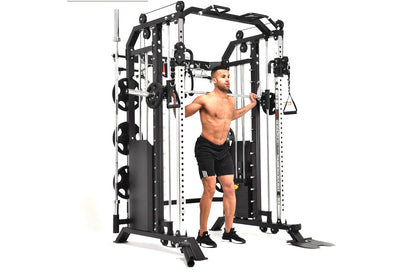 Black and white multi-functional home gym cable crossover machine with smith bar, used by shirtless male model in black short