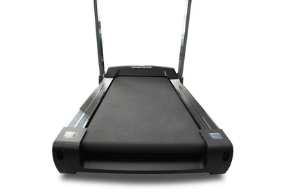 Black folding treadmill with gray rails and dual handles, textured running belt on white background