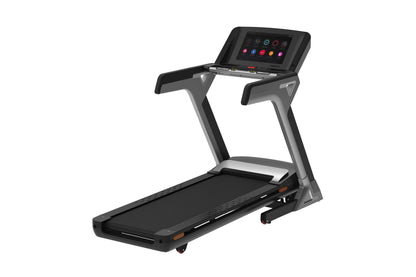 Black and gray motorized treadmill with digital touchscreen console displaying colorful icons, on white background