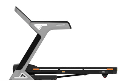 Gray and black folding treadmill with orange accents, digital display, and M6 model designation on white background
