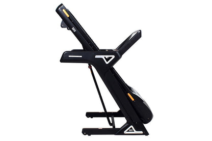 Black folding treadmill with adjustable incline, touchscreen console, and orange accent details on white background