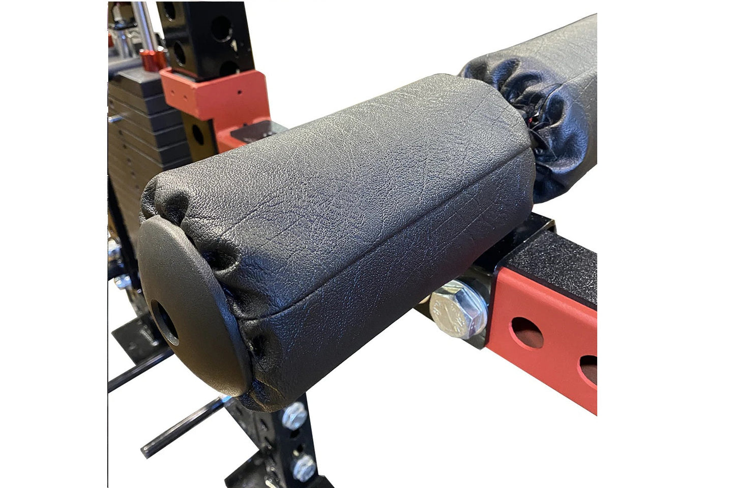 Warrior 2.0 cable crossover pulley system with textured black and gray cylindrical weights, red metal frame, and blue adjustm