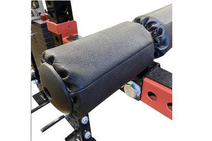 Warrior 2.0 cable crossover pulley system with textured black and gray cylindrical weights, red metal frame, and blue adjustm