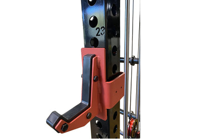 Black powder-coated steel power rack with red pulley attachment and cable crossover system on white background