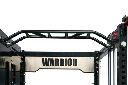 Black steel cable crossover pulley power rack with "Warrior" branding on silver nameplate, red indicator lights, and overhead