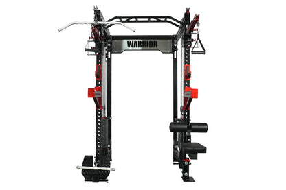Warrior dual cable crossover machine with black steel frame, red pulleys, lat pulldown attachment, and silver top bar on whit