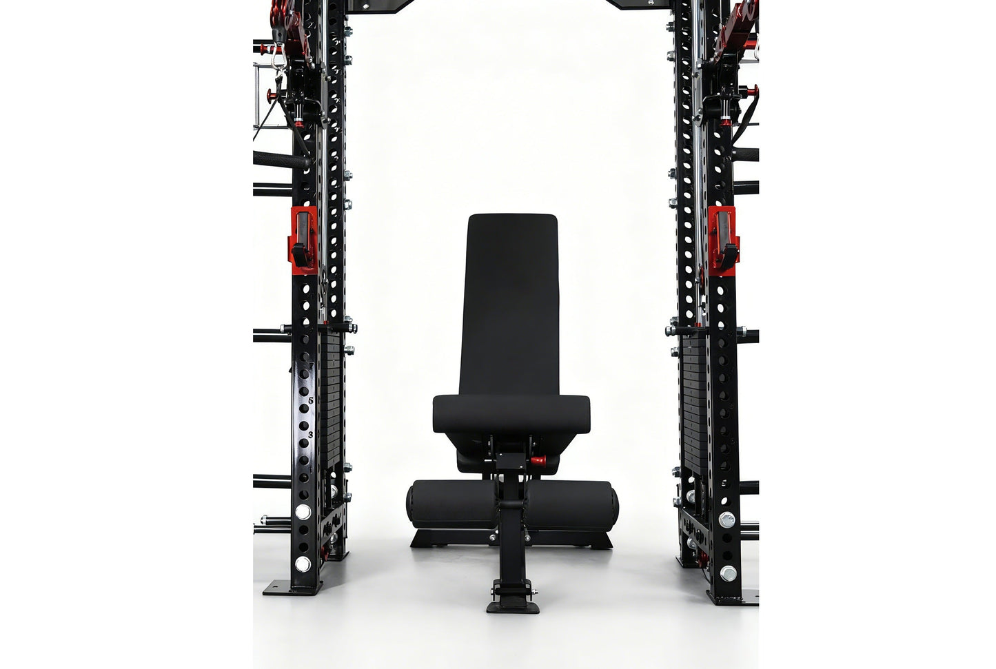 Black and red cable crossover power rack with dual weight stacks, lat pulldown station, and adjustable black weight bench pos