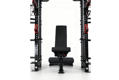 Black and red cable crossover power rack with dual weight stacks, lat pulldown station, and adjustable black weight bench pos