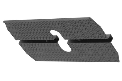 Gray textured metal footplate with center oval cutout and black side rails, front view on white background