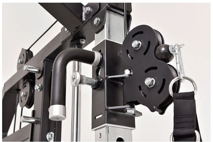 Black and silver functional trainer cable crossover gym machine with dual weight plate pegs, handles, and adjustable pulleys 