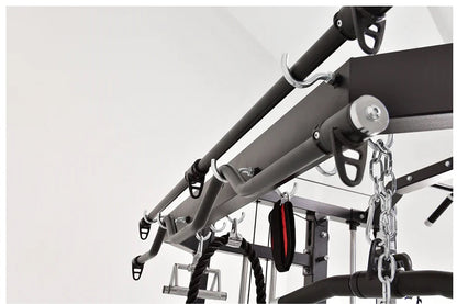 Warrior 801 functional trainer with dual cable crossover arms, metal frame, and chain attachments on white background